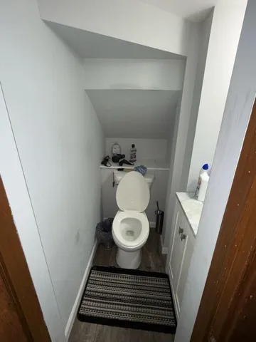 a room with gym equipment and a mirror