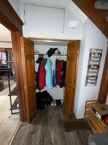 a bathroom with a sink toilet and a mirror