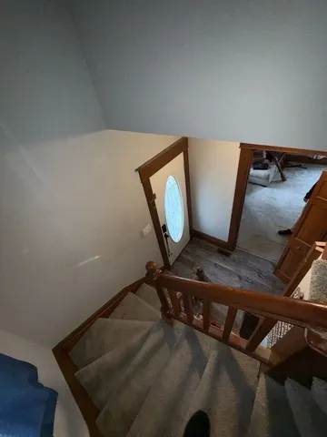 a bathroom with a toilet and a bathtub