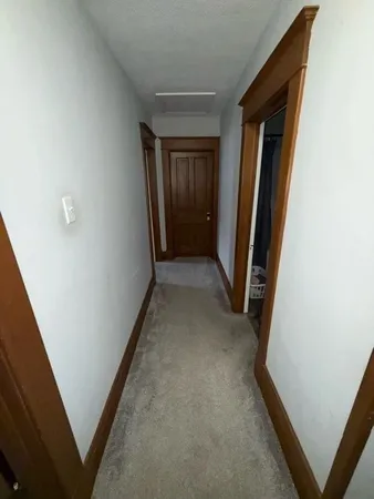 a front view of a house with parking space