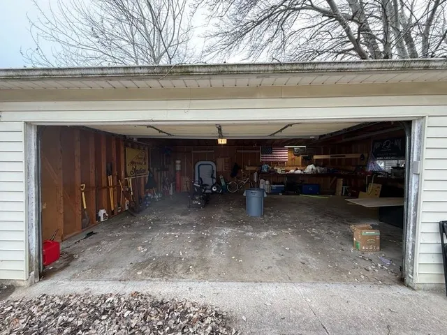 a view of parking garage with cars