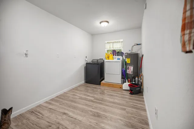 a view of utility room with dryer and washer