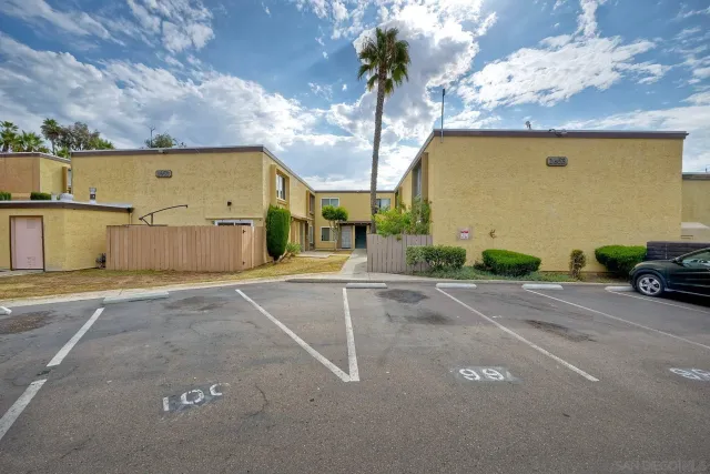 a view of a street with a building in the background