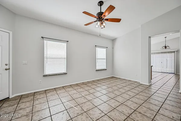 a view of an empty room and window