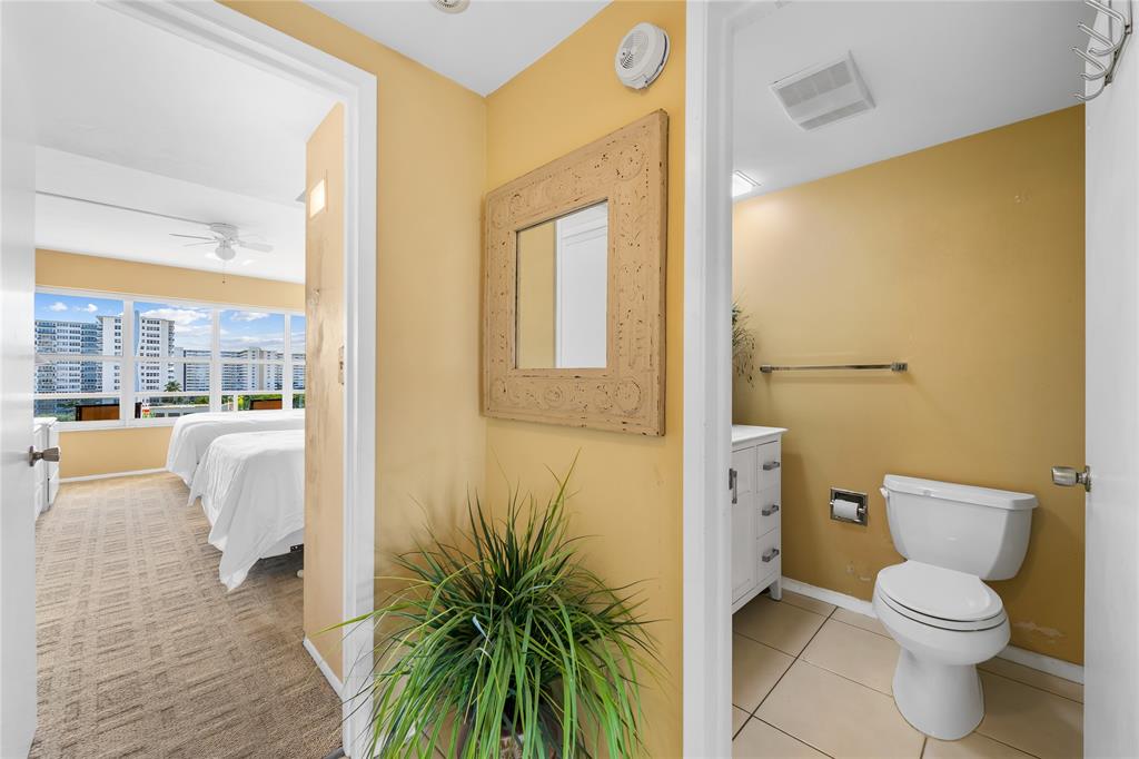 3700 Galt Ocean Drive, Unit 714 Fort Lauderdale, FL 33308 - Photo 20 of 39 a bathroom with a toilet and a shower