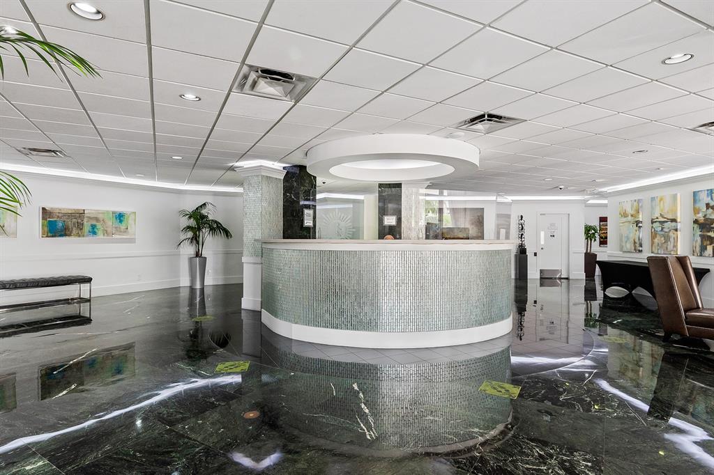 3700 Galt Ocean Drive, Unit 714 Fort Lauderdale, FL 33308 - Photo 38 of 39 a view of a room with gym equipment