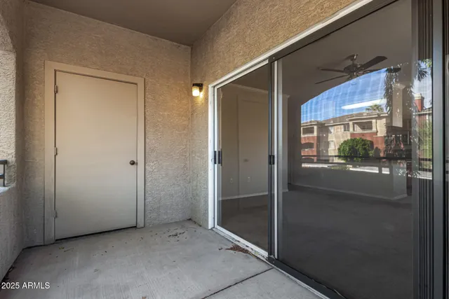 a view of a bathroom with a glass door