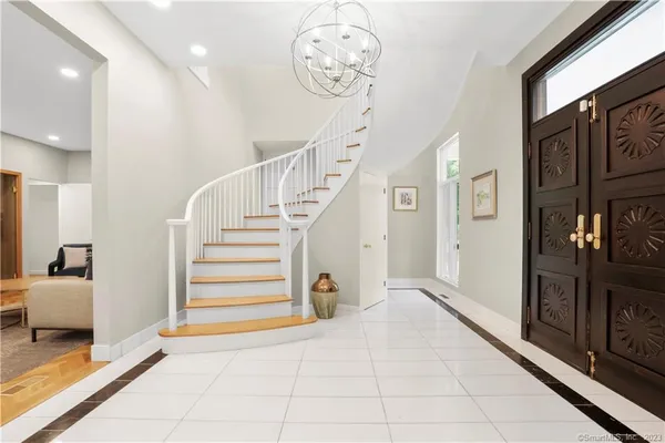 a view of entryway livingroom and hall