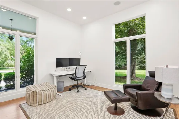 a living room with furniture and a window