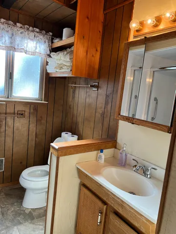 a bathroom with a shower and a tub