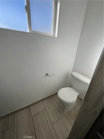 a bathroom with a sink vanity and mirror
