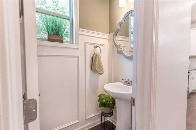 a view of entryway with wooden floor and stairs