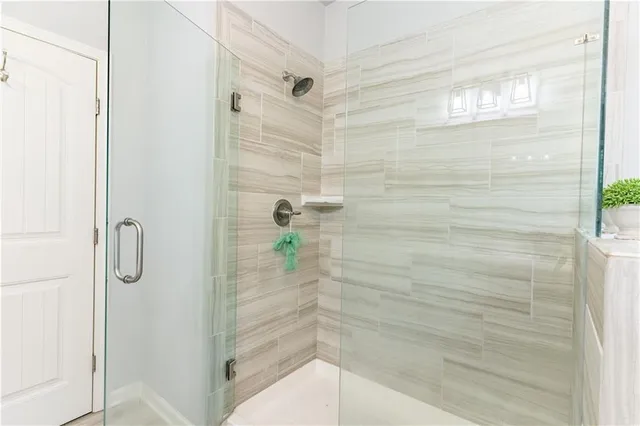 a bedroom with a bed and a closet