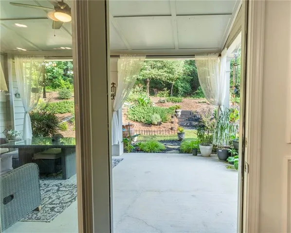 a view of a backyard of the house