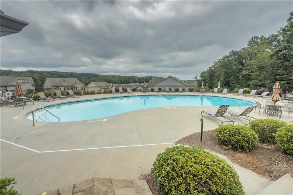 3041 Vista Ridge Braselton, GA 30517 - Photo 56 of 56 a view of a swimming pool and an outdoor seating