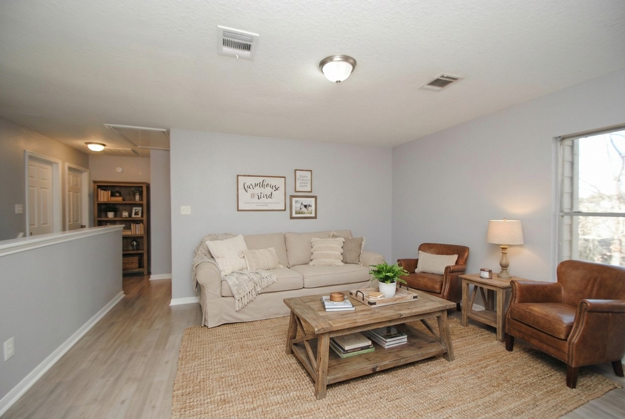 7514 Danehill Drive Spring, TX 77389 - Photo 13 of 19 a living room with furniture and a couch