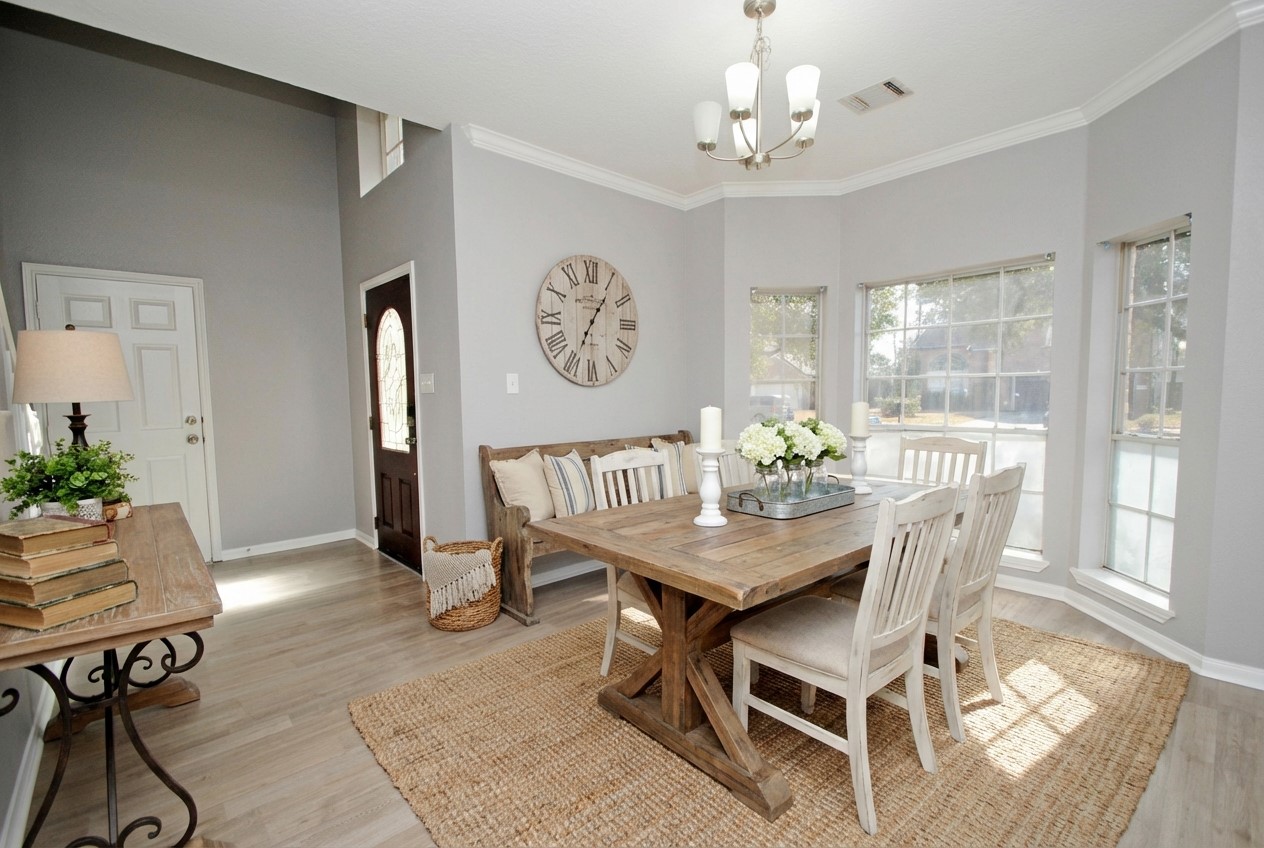 7514 Danehill Drive Spring, TX 77389 - Photo 3 of 19 a view of a dining room with furniture window and wooden floor