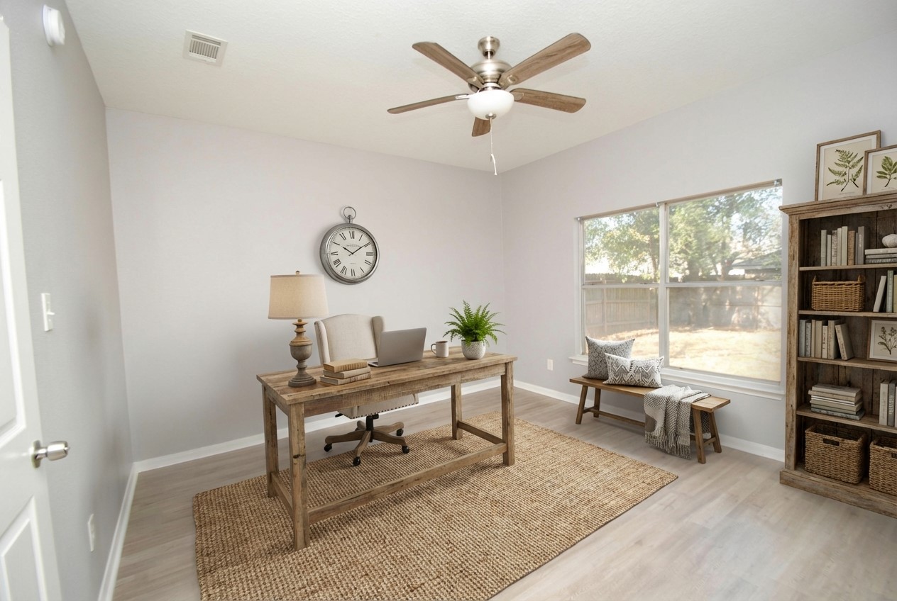 7514 Danehill Drive Spring, TX 77389 - Photo 7 of 19 a view of a workspace with furniture and a window