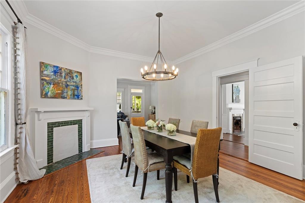 320 Ferguson Street Northeast Atlanta, GA 30307 - Photo 11 of 28 a view of a dining room with furniture window and wooden floor
