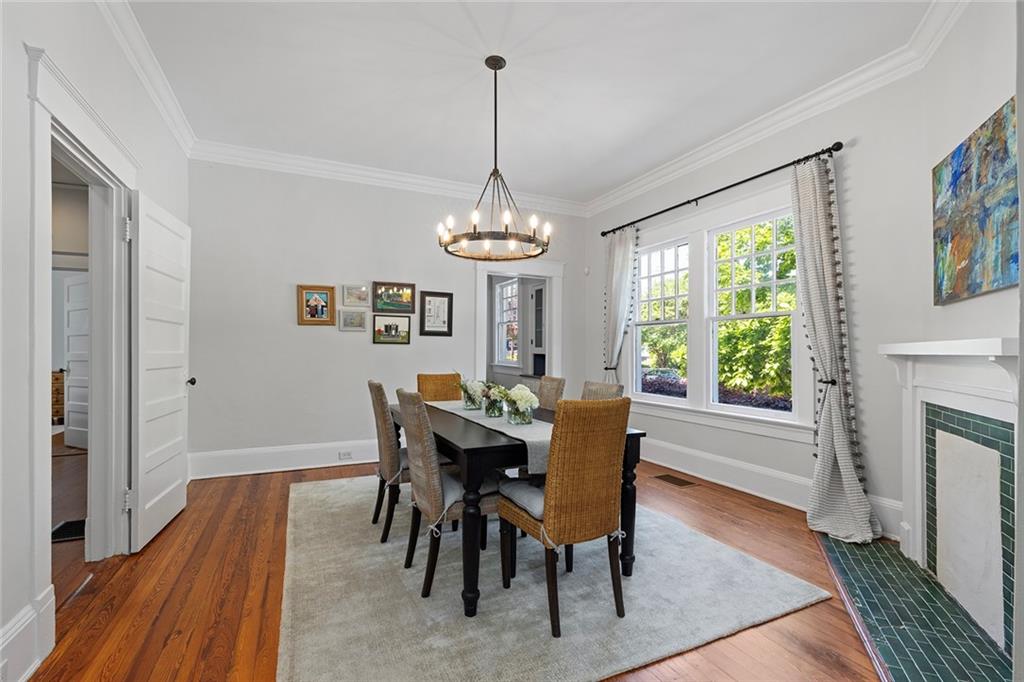 320 Ferguson Street Northeast Atlanta, GA 30307 - Photo 12 of 28 a view of a dining room with furniture window and wooden floor