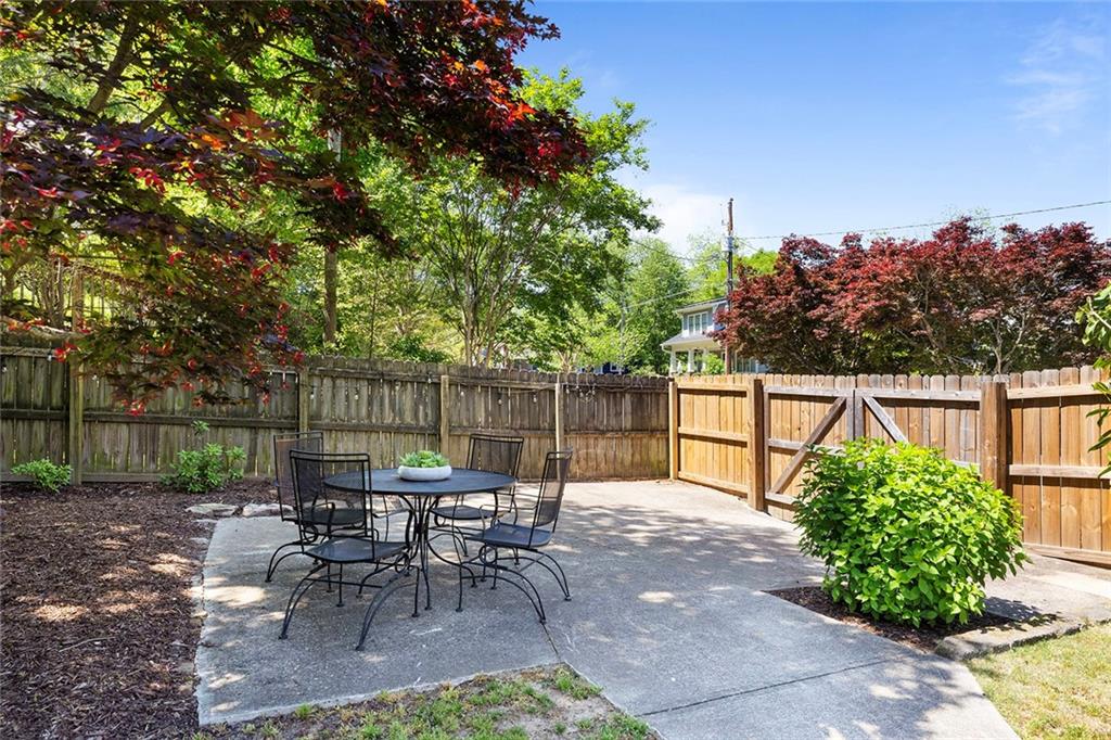 320 Ferguson Street Northeast Atlanta, GA 30307 - Photo 24 of 28 a view of a bench in a backyard