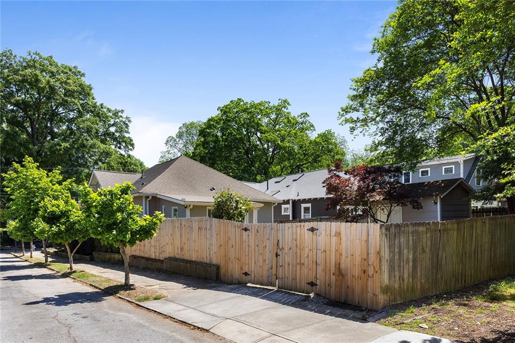 320 Ferguson Street Northeast Atlanta, GA 30307 - Photo 28 of 28 a view of a chairs and table in the backyard