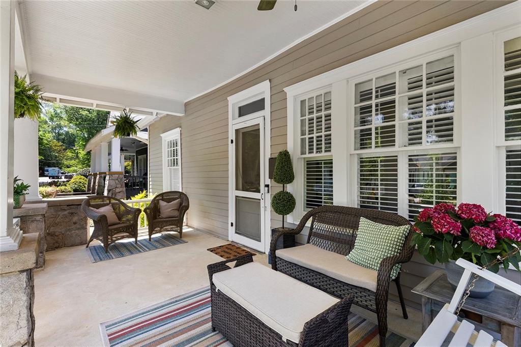320 Ferguson Street Northeast Atlanta, GA 30307 - Photo 5 of 28 a view of a patio with couches chairs and potted plants