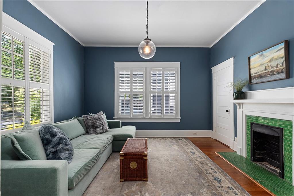320 Ferguson Street Northeast Atlanta, GA 30307 - Photo 9 of 28 a living room with furniture a window and a fireplace