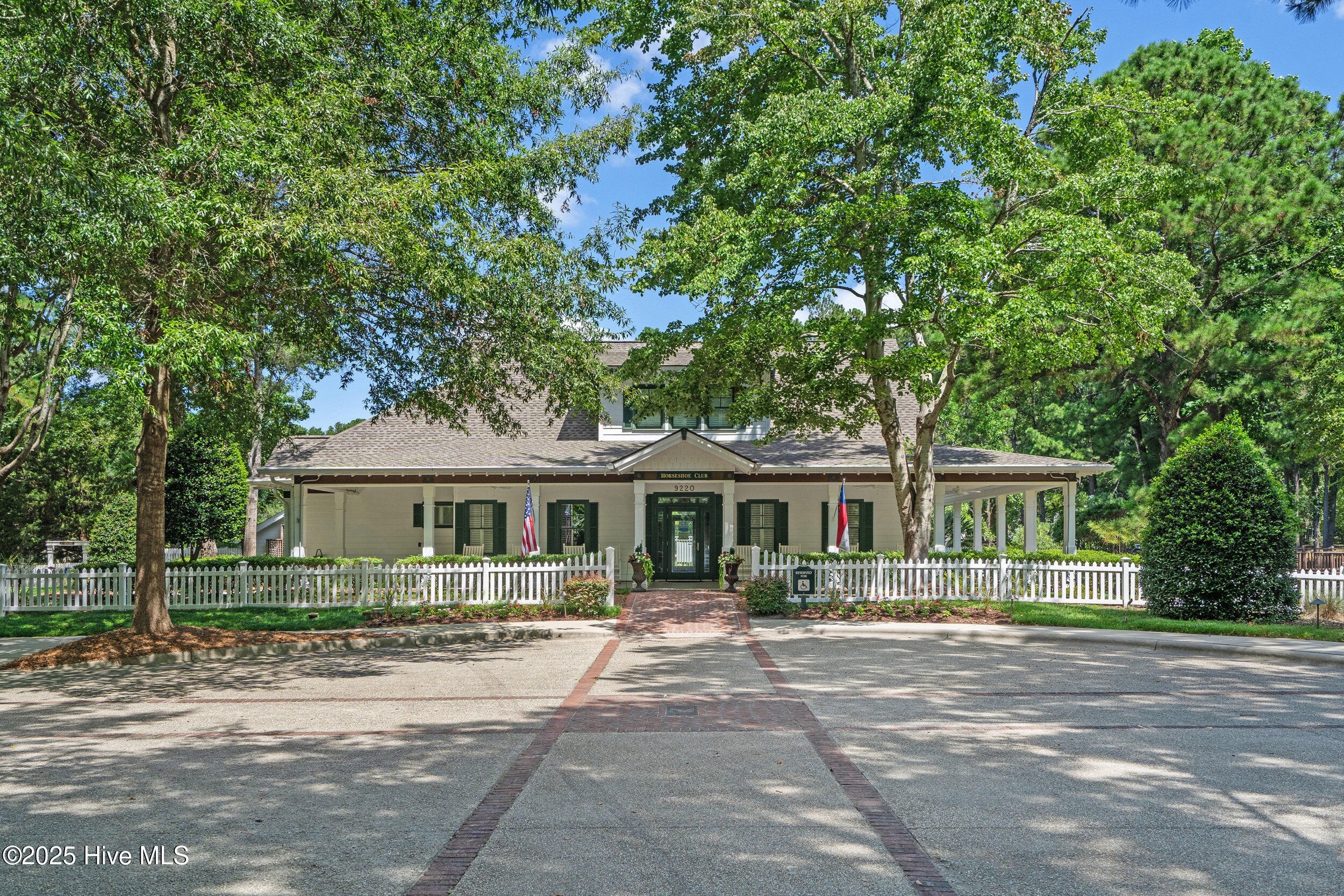 9266 West Lake Road Calabash, NC 28467 - Photo 12 of 15 Upscale clubhouse with huge pool overlooking ponds with fountains. Fitness center, walking and bike trails.