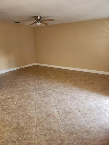 a view of a room with an empty space