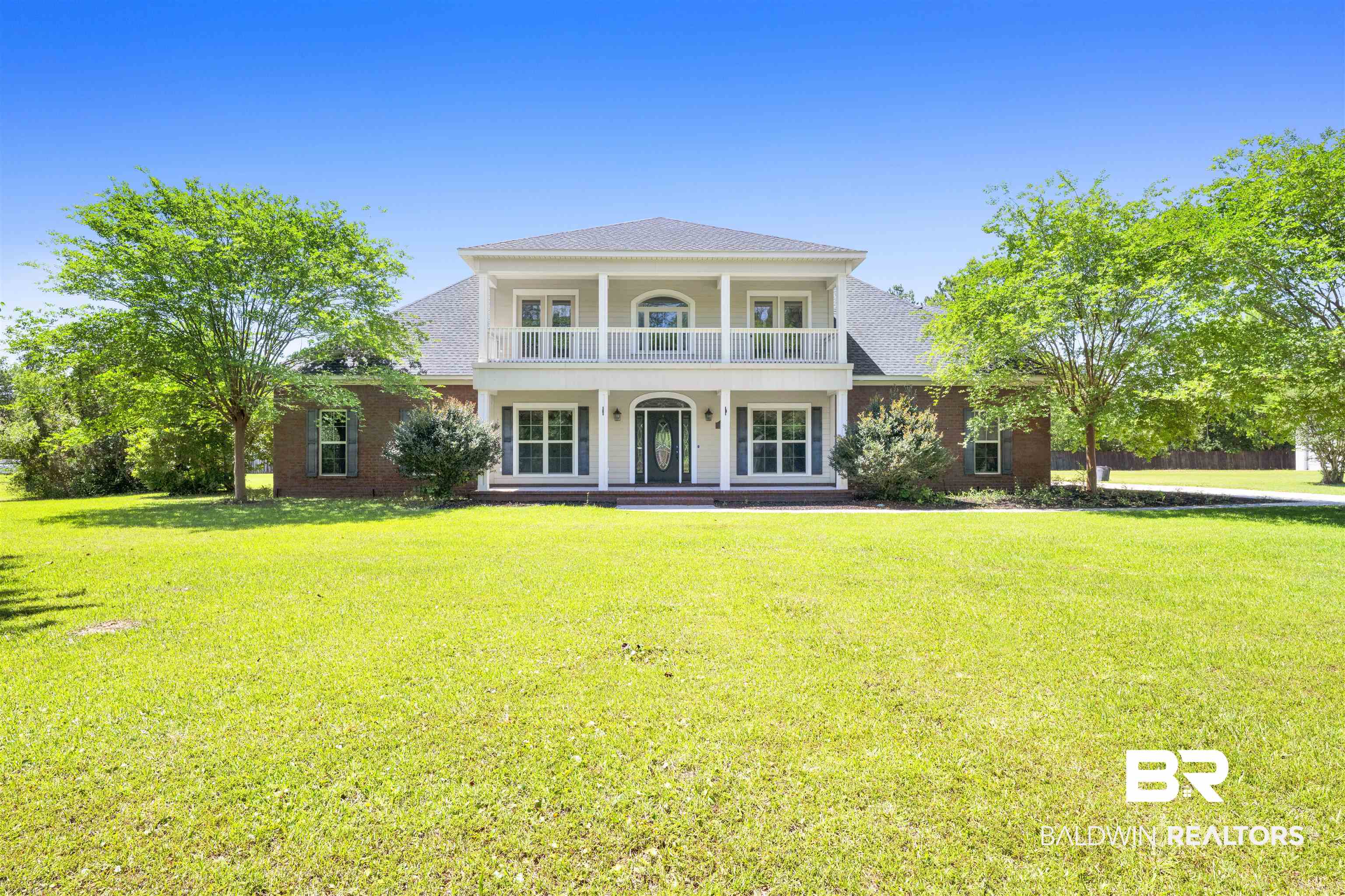 12944 Anna's Way Stapleton, AL 36578 - Photo 16 of 64 Colonial-style residence featuring a brick facade and a central two-story portico