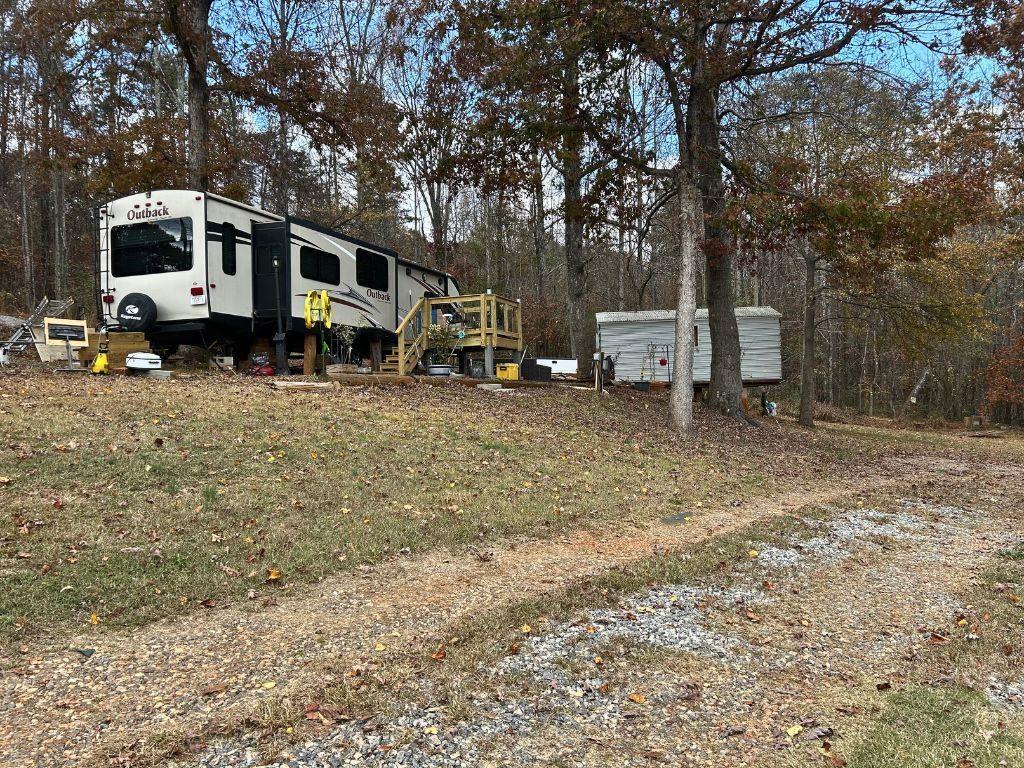 152 Rocket Drive Cleveland, GA 30528 - Photo 6 of 12 a view of a house with a yard