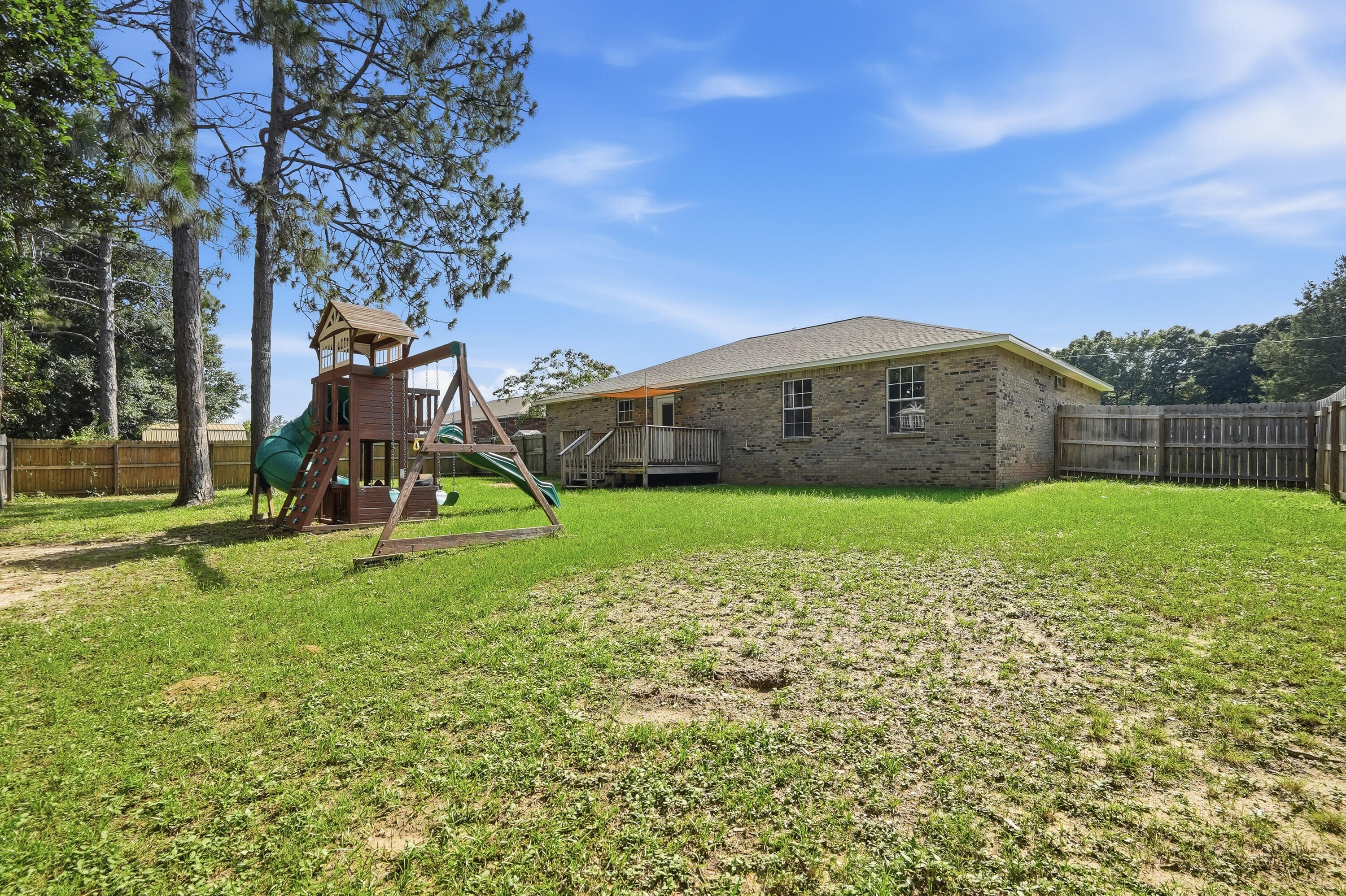 3033 Cabela Lane Crestview, FL 32539 - Photo 28 of 32 a view of a garden