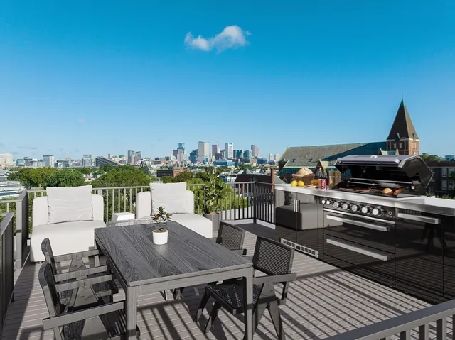 a terrace of a house with outdoor seating