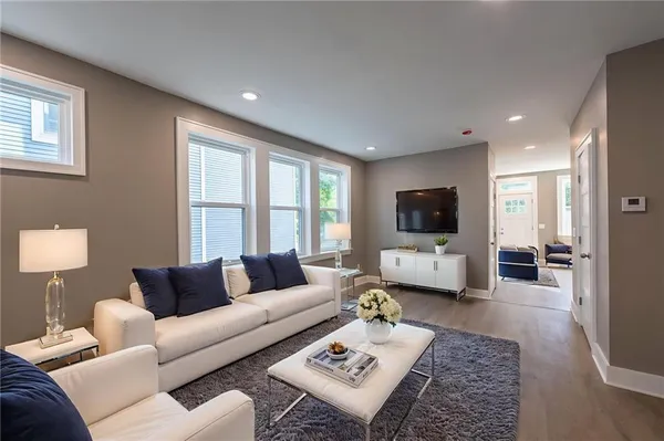 a view of entryway with wooden floor