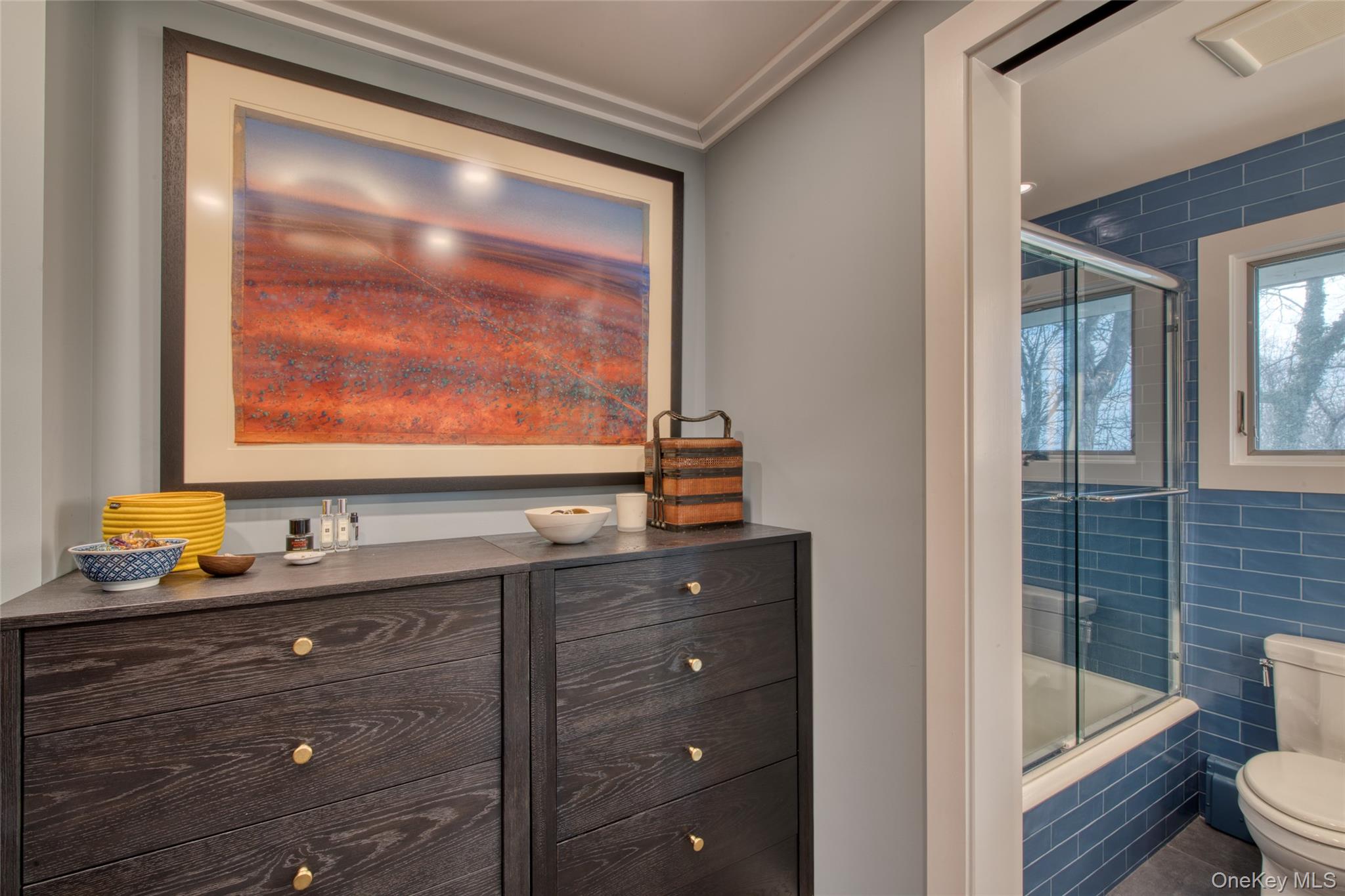 495 Maple Lane Orient, NY 11957 - Photo 14 of 17 a bathroom with a sink mirror and toilet