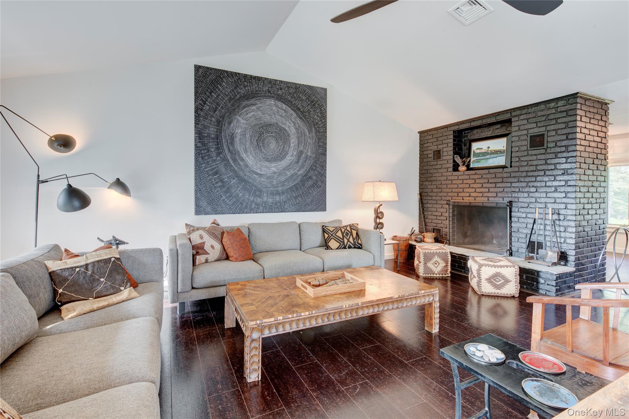495 Maple Lane Orient, NY 11957 - Photo 8 of 17 a living room with furniture and a fireplace