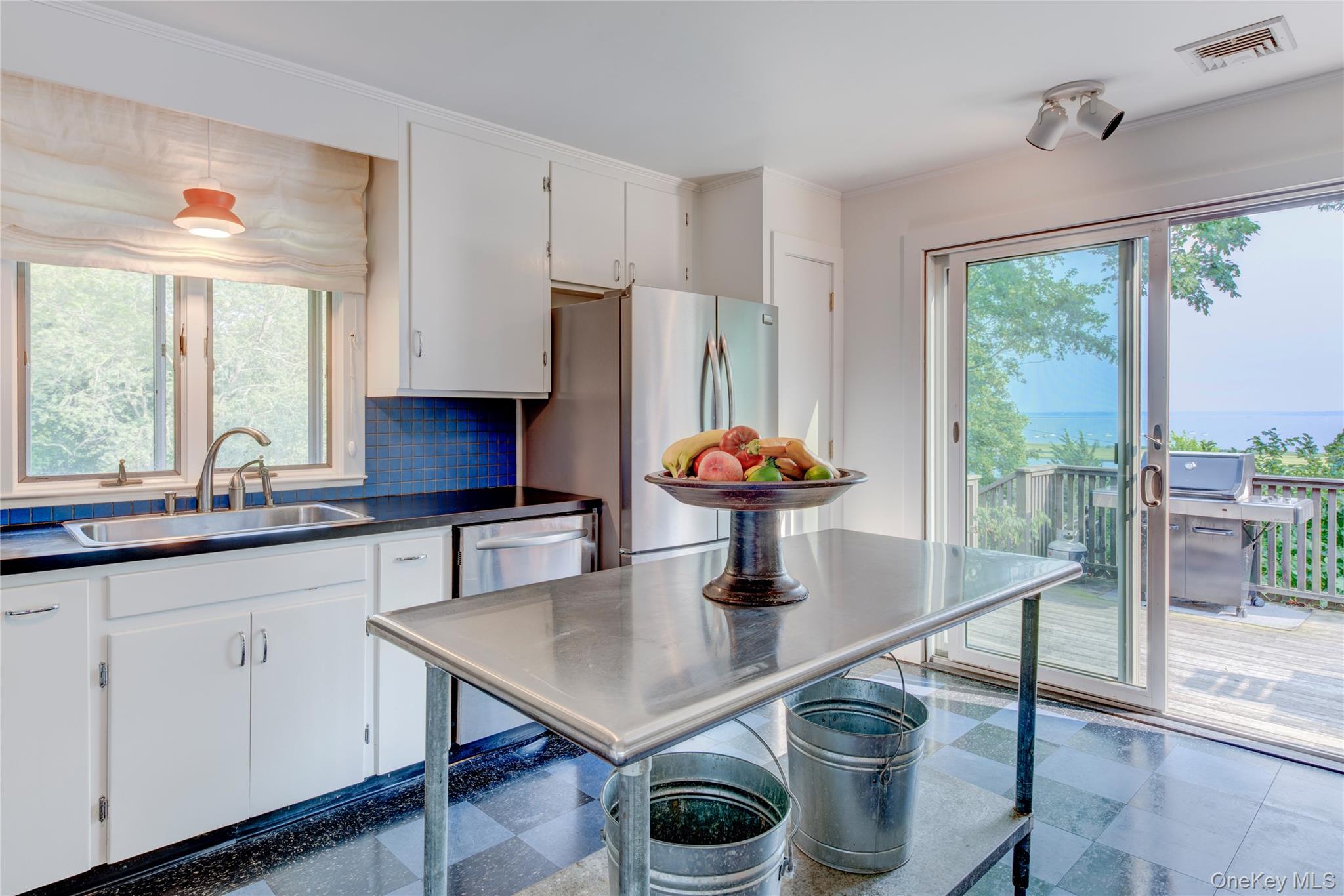 495 Maple Lane Orient, NY 11957 - Photo 9 of 18 kitchen, glass door to deck