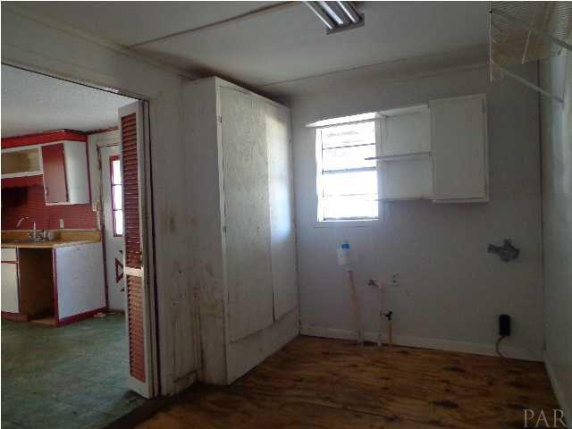 2280 Harvest Road Jay, FL 32565 - Photo 6 of 18 Laundry with Cabinets