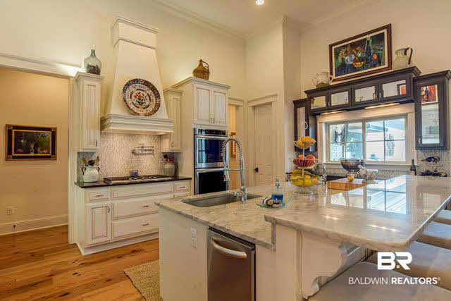 32576 Whimbret Way Daphne, AL 36527 - Photo 12 of 25 Reclaimed Heart Pine flooring, Cararra Marble, Double Ovens, Freestanding Ice Maker