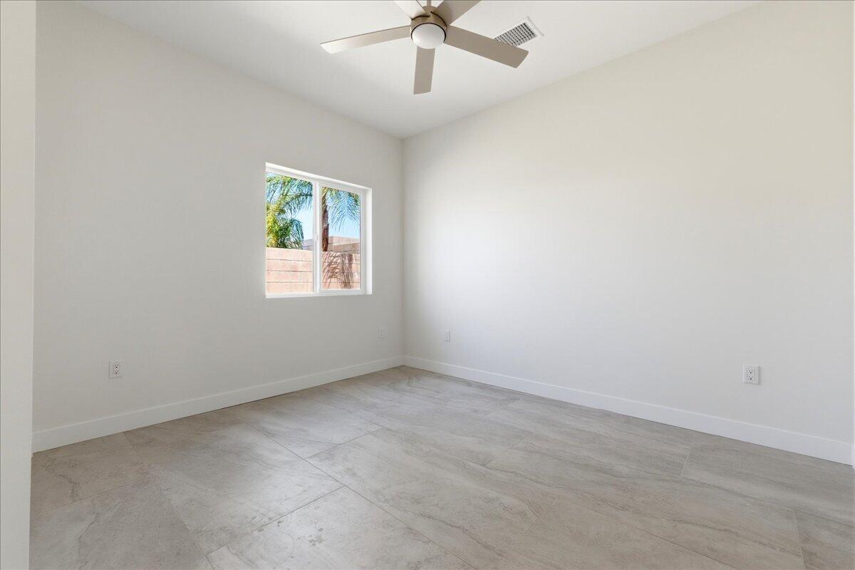 68160 Modalo Road Cathedral City, CA 92234 - Photo 49 of 57 an empty room with a window