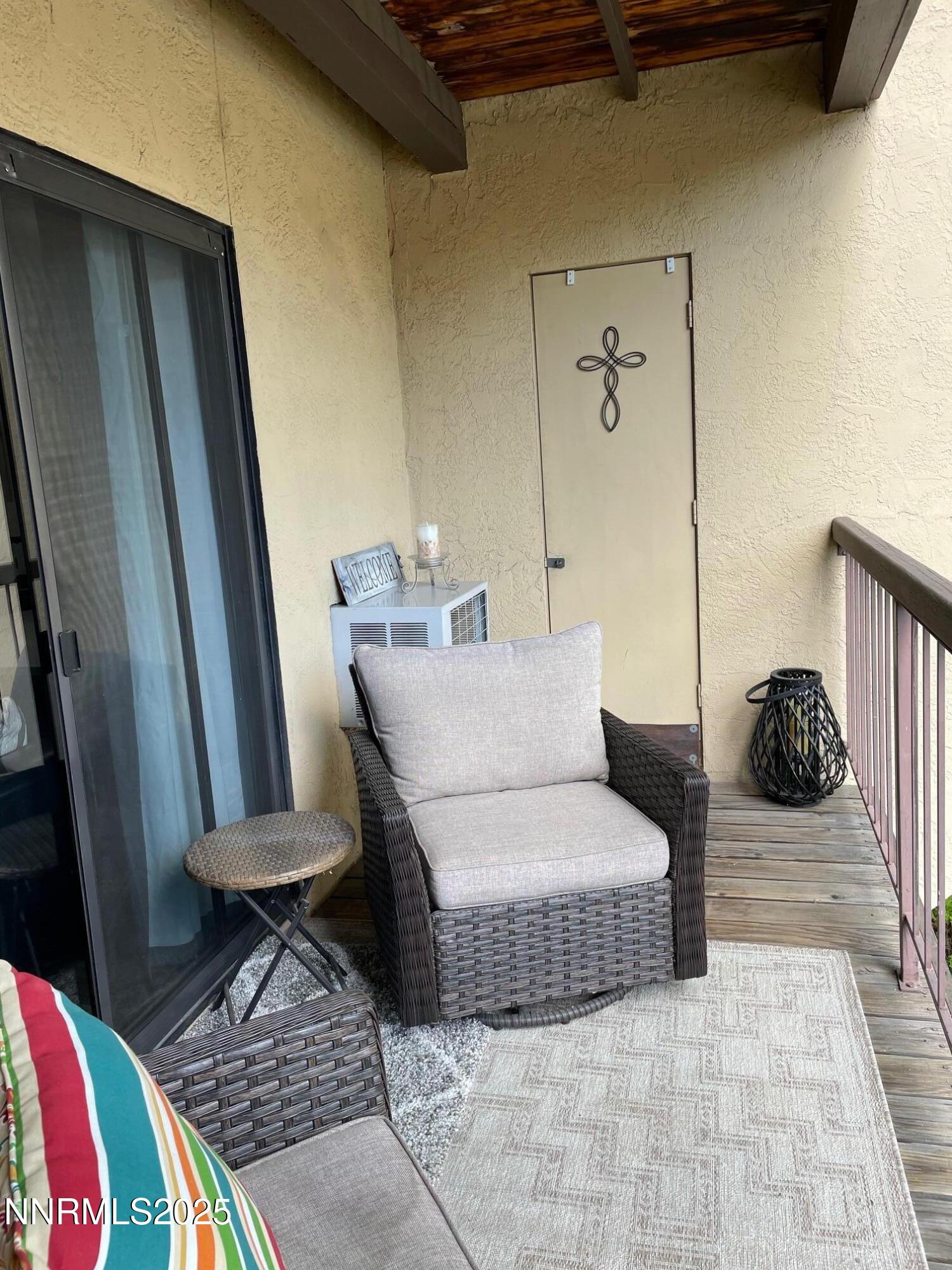 2450 Lymbery Street, Unit 230 Reno, NV 89509 - Photo 16 of 24 a living room with a couch and a table
