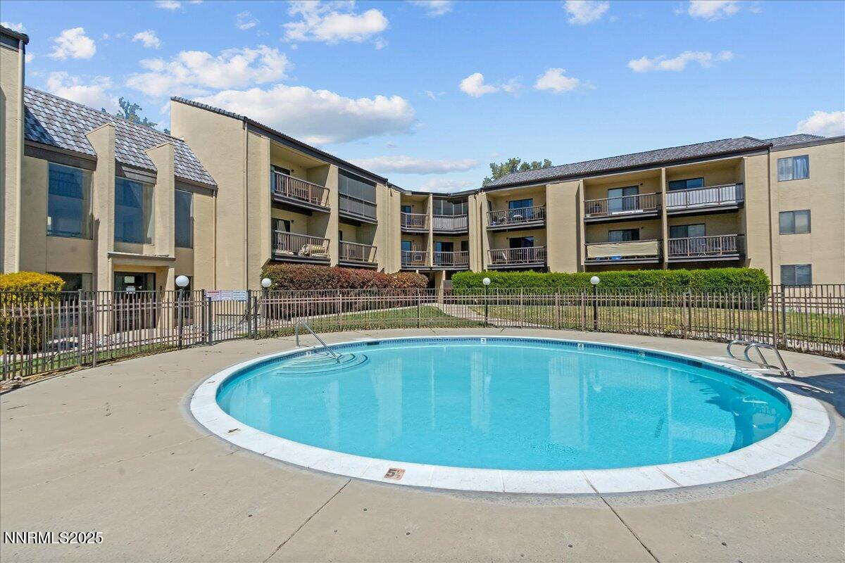 2450 Lymbery Street, Unit 230 Reno, NV 89509 - Photo 22 of 24 a view of outdoor space yard swimming pool and porch