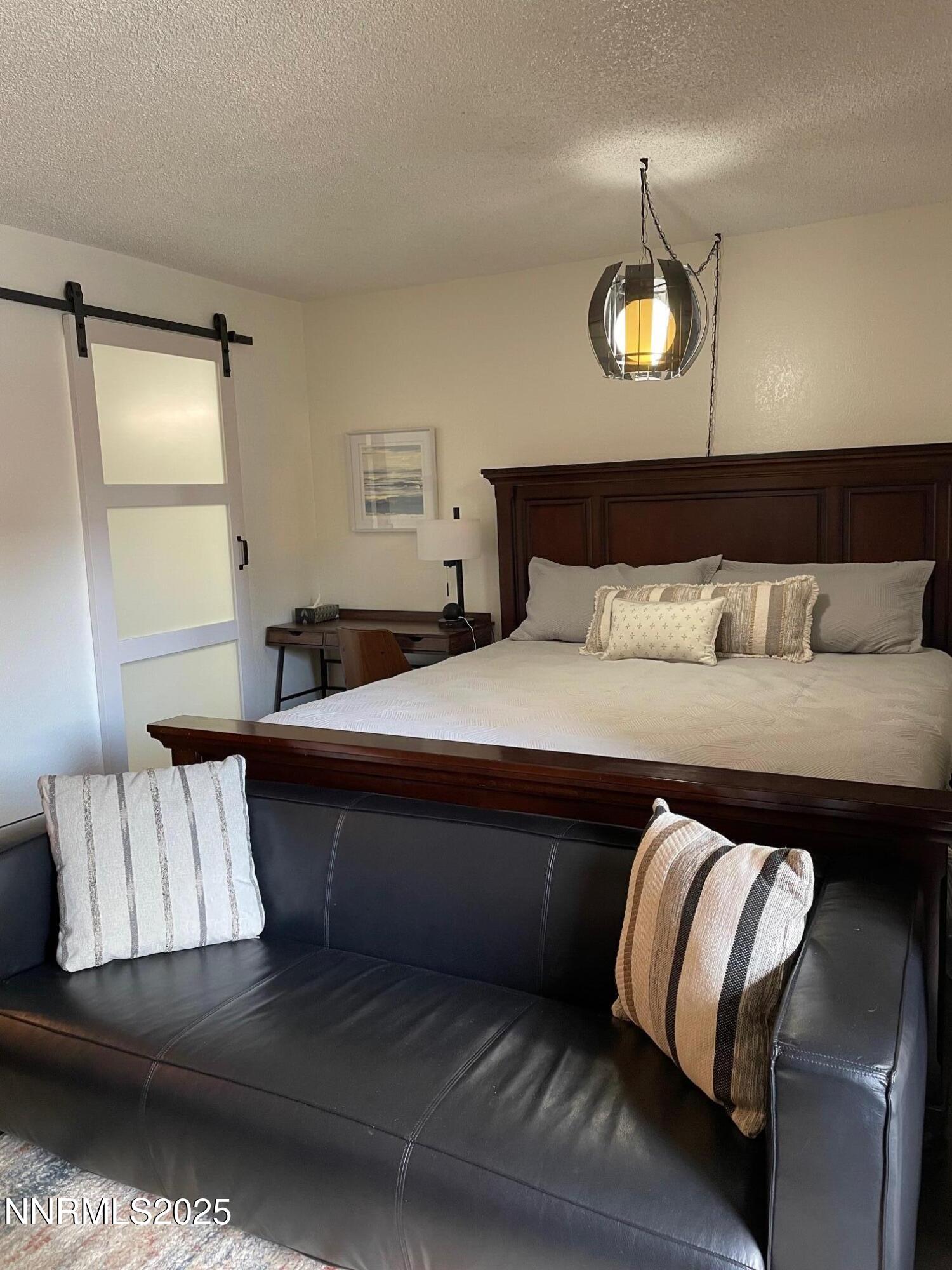 2450 Lymbery Street, Unit 230 Reno, NV 89509 - Photo 8 of 24 a bedroom with a bed and window