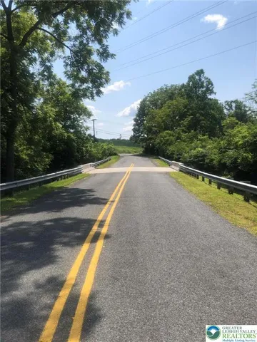 a view of a street with a road
