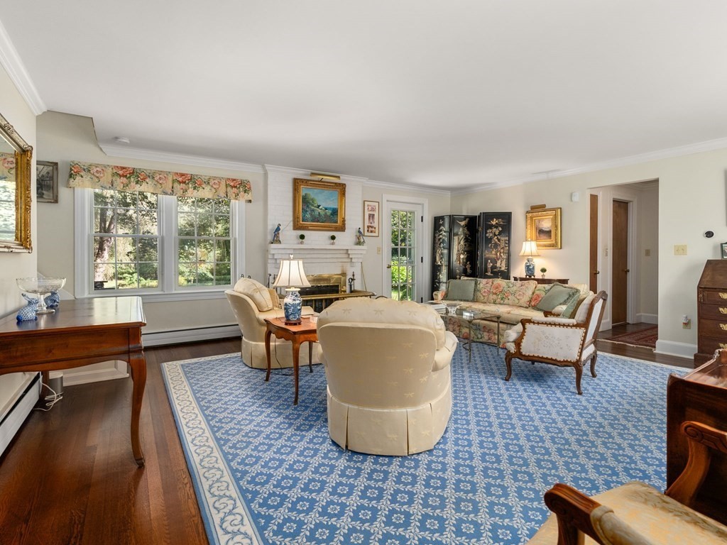 44 River Road Wayland, MA 01778 - Photo 16 of 38 a living room with furniture and a large window
