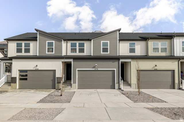 4775 Olive Avenue, Unit 412 Mapleton, UT 84664 - Photo 1 of 19 View of front of house with concrete driveway, a shingled roof, and a garage