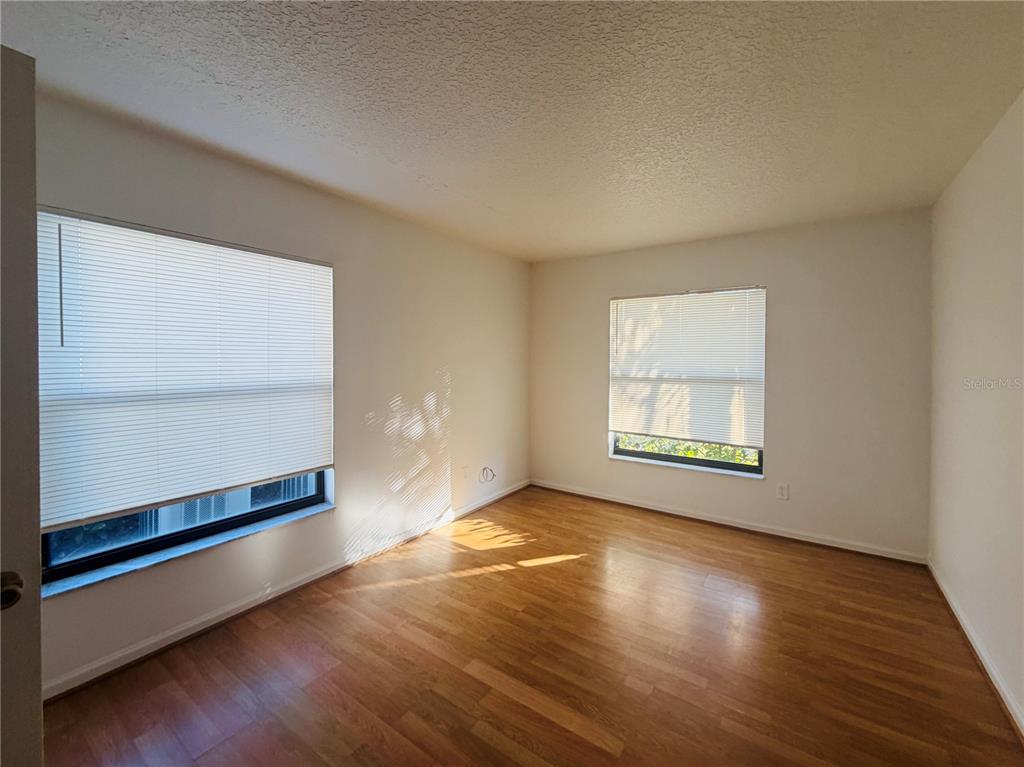 1114 South Pine Ridge Circle, Unit 14 Sanford, FL 32773 - Photo 5 of 10 a view of an empty room and window