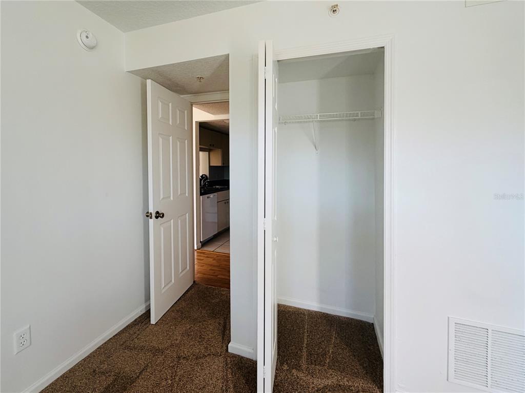 1114 South Pine Ridge Circle, Unit 14 Sanford, FL 32773 - Photo 7 of 10 a view of a hallway
