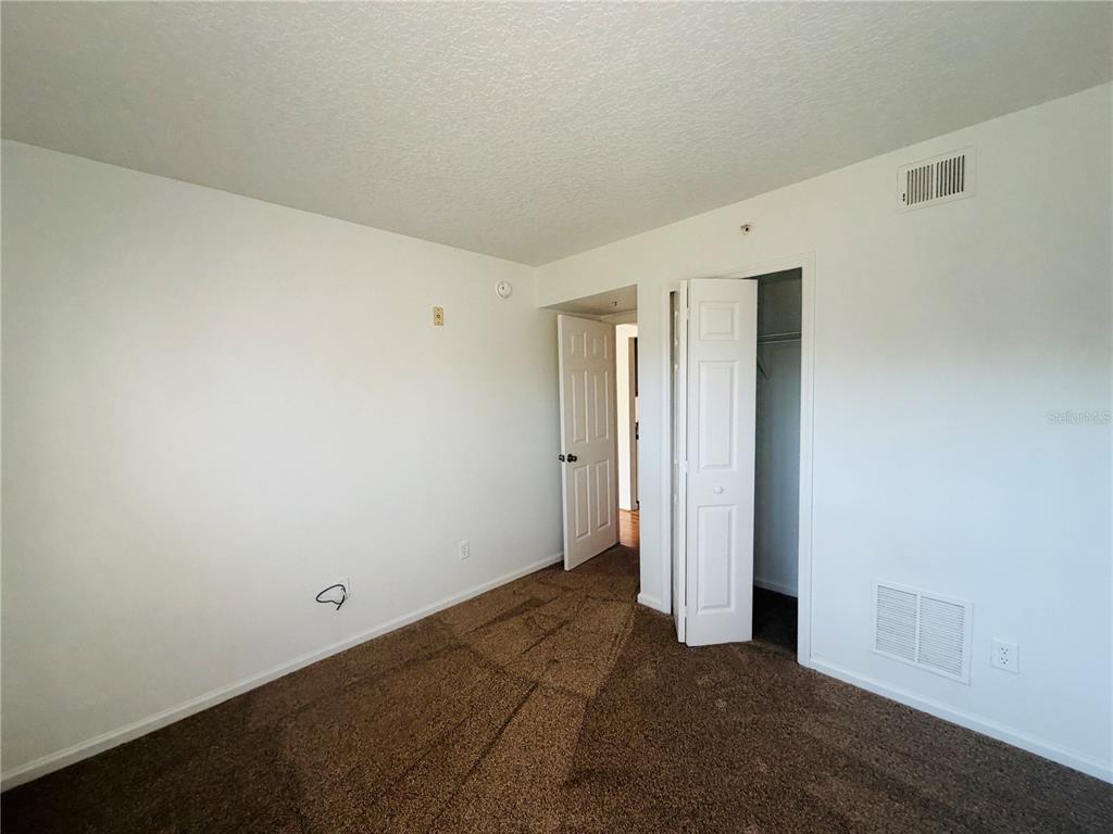 1114 South Pine Ridge Circle, Unit 14 Sanford, FL 32773 - Photo 8 of 10 a view of an empty room